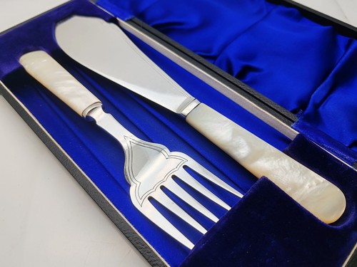 Cased silver plated fish - cased,