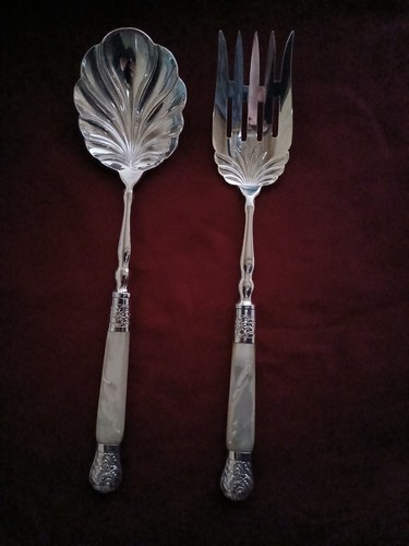 Mother pearl handled - of,